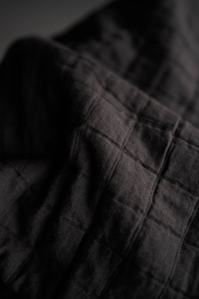 Quilted Jacquard Indian Cotton Dressmaking Fabric in 'Lunar Black’ by Merchant and Mills