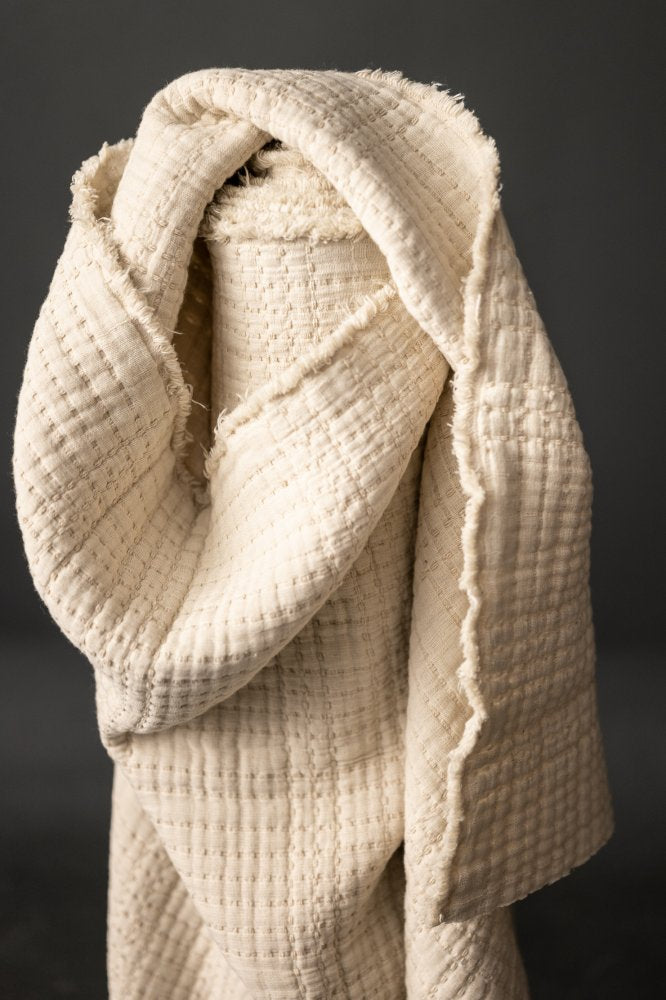 Quilted Jacquard Indian Cotton Dressmaking Fabric in 'Ecru’ by Merchant and Mills