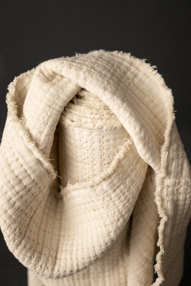 Quilted Jacquard Indian Cotton Dressmaking Fabric in 'Ecru’ by Merchant and Mills