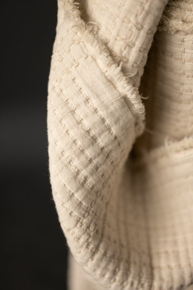 Quilted Jacquard Indian Cotton Dressmaking Fabric in 'Ecru’ by Merchant and Mills