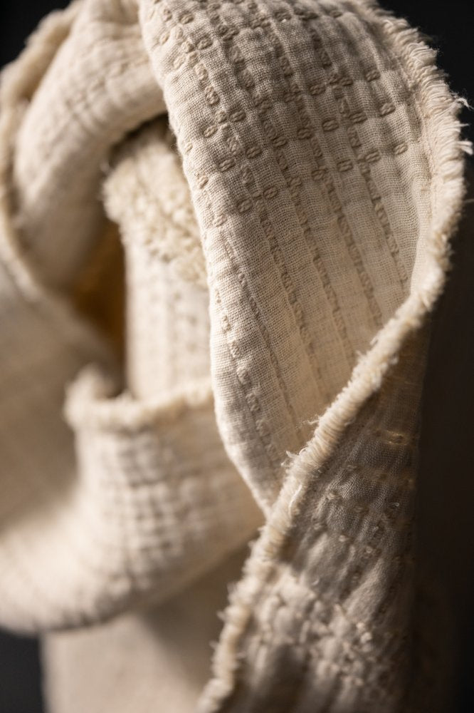 Quilted Jacquard Indian Cotton Dressmaking Fabric in 'Ecru’ by Merchant and Mills