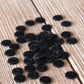 Bouton essentiel noir